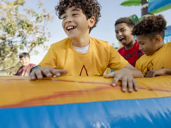 Children playing in bouncy house